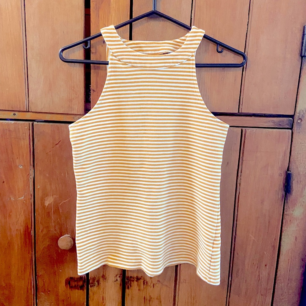 Yellow and white sleeveless top with cut-out back detail